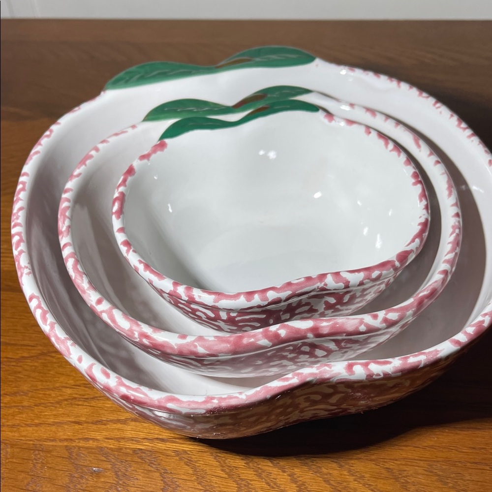 Light red (almost looks pink) and White Ceramic Nesting Bowls